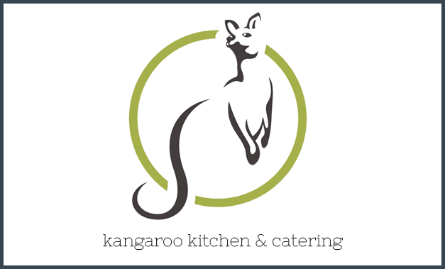 A logo of a cat with the words kangaroo kitchen and catering underneath it.