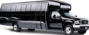 A black limo with its doors open.